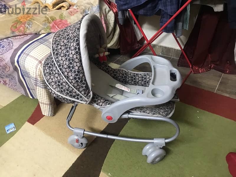 Graco stroller and car chairعربية 13