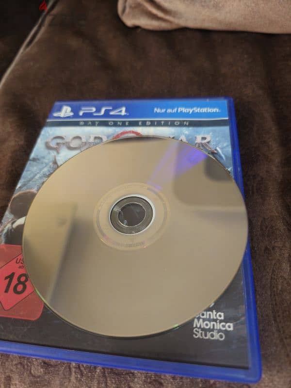 god of war ps4 and fifa 24 ps5 (English version) 1