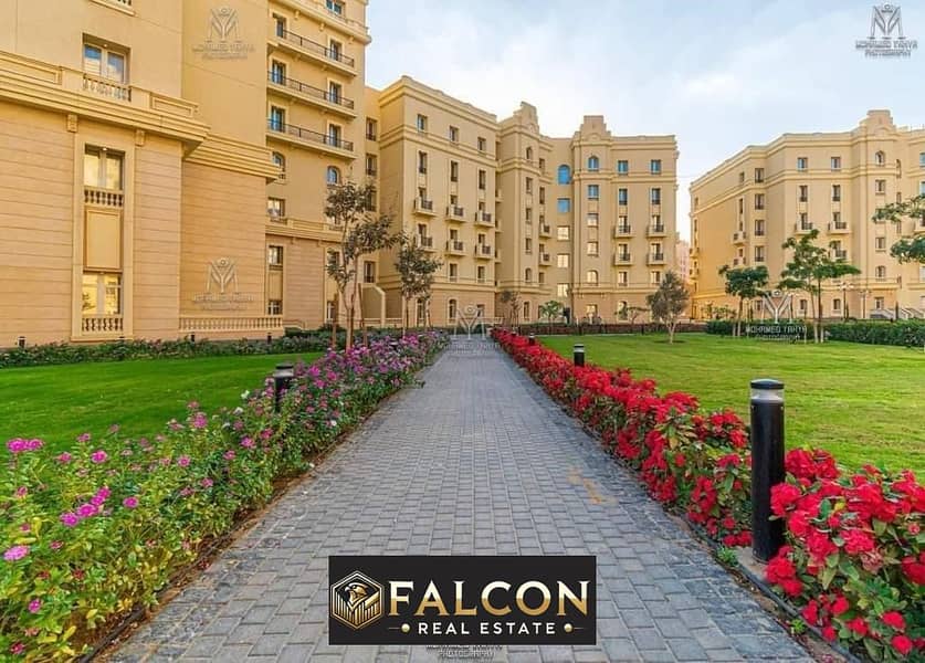 Apartment for sale in Garden City R5 Compound in the Administrative Capital, with an area of ​​123 meters in front of the iconic tower, in installment 0