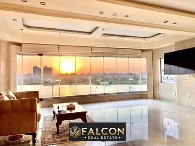 For sale, an apartment directly on the Nile, with a down payment of 3.5 million, with a mandatory lease contract to rent the unit in Maadi