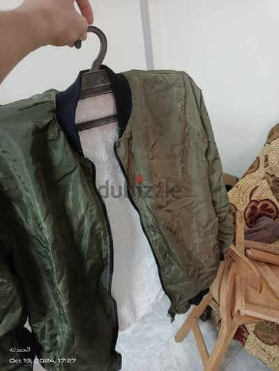 جاكت وتر بروف زيتى Olive waterproof jacket