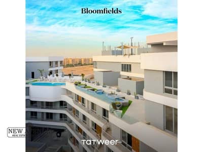 Corner Lake View APT for sale in Bloomfields Mostakbal city Overlooking lake and greenery - Core and shell