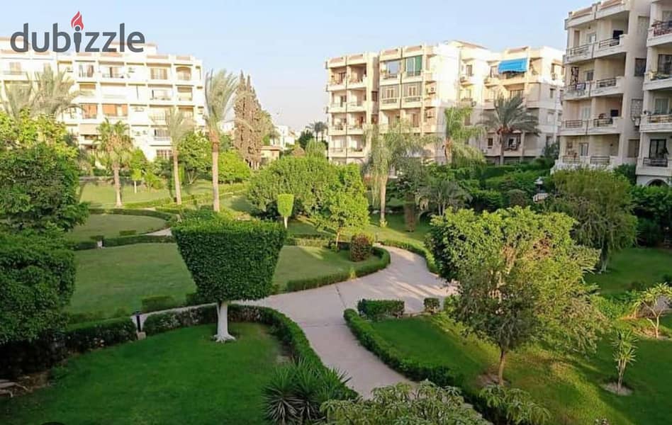 For sale, ground floor apartment in the garden of Zayed Compound 2000, double view (two facades), landscape view, 210 meters, garden 60 meters, Sheikh 0