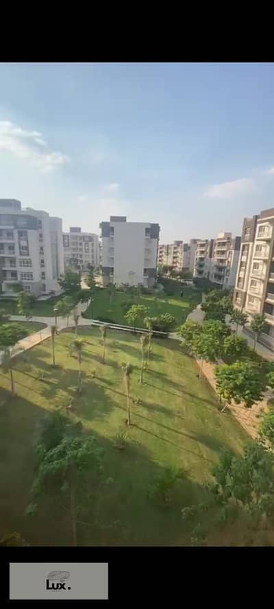 Apartment for sale in Madinaty, police allocation, area 116 m, wide garden view, in the most upscale phases of Madinaty, B12, repeated floor