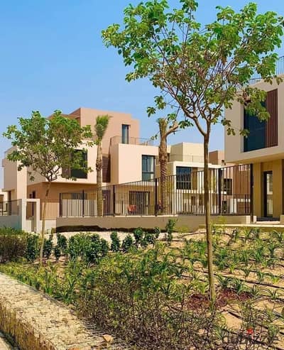 Finished townhouse villa in The Estates by Sodic in front of Sphinx Airport next to Ora