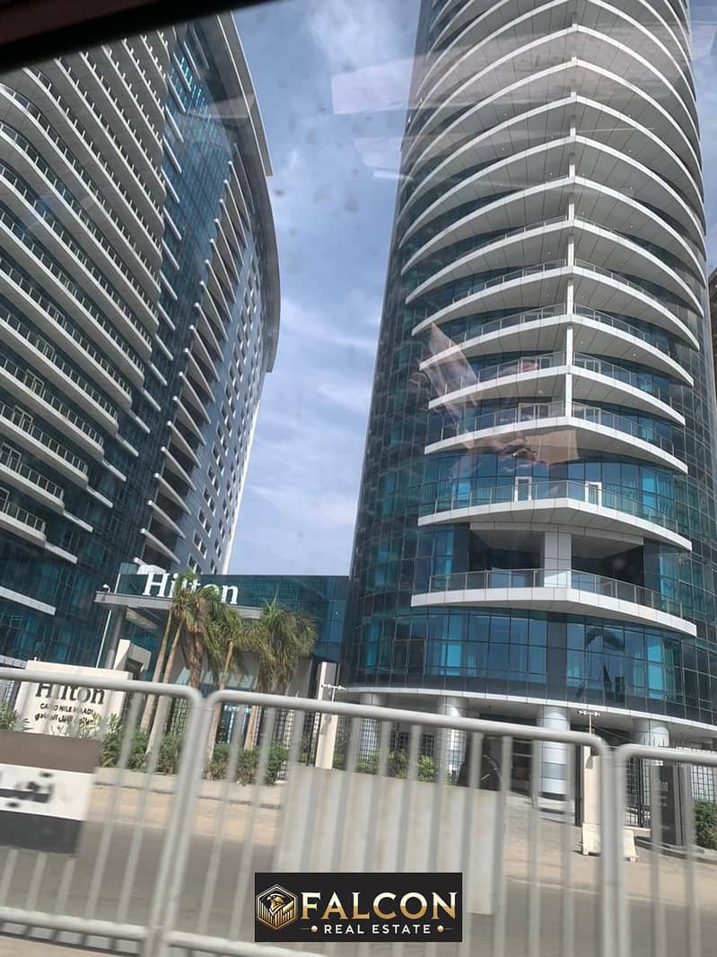 For sale, an apartment with immediate delivery, first row on the Nile, immediate delivery, in Hilton Towers, fully finished with air conditioners 0