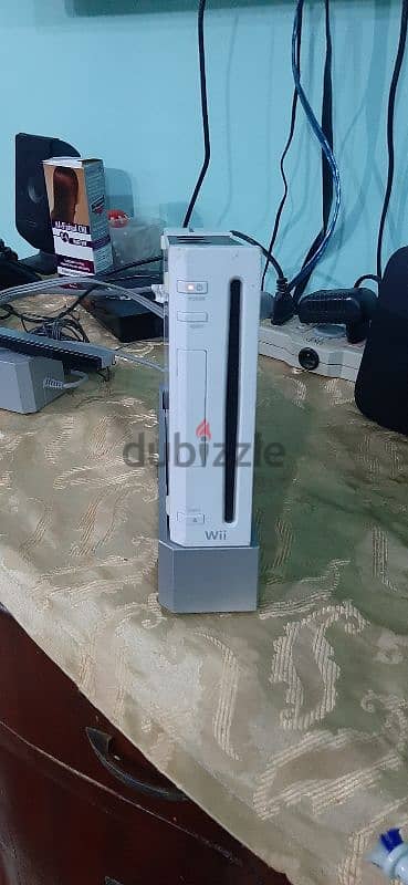 جهاز Wii بحالة جيده باكسسواراته ، معدل سوفت  ، بفلاشه عليها العاب كتير 2