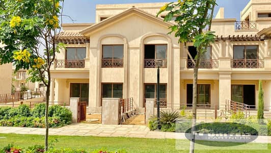 Villa for sale in Madinaty, Four Seasons Phase, prime location with a clear front view of a wide garden.