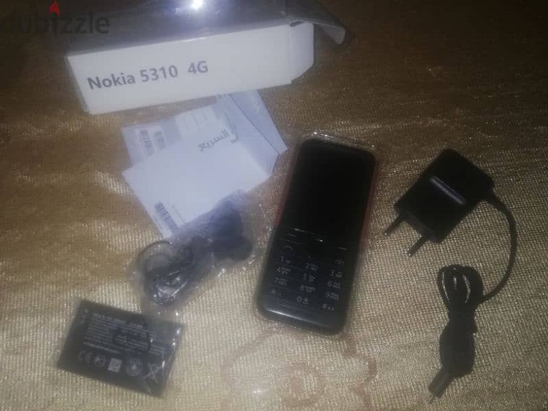 Nokia 5310 اسود جديد وارد الامارات 1