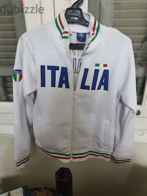 Imported white heavy jacket from Italy size 11/12 years 0