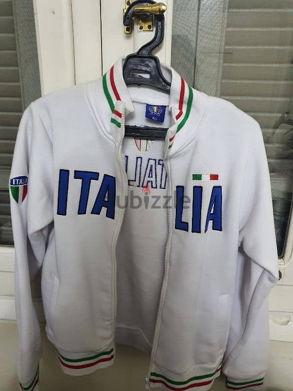 Imported white heavy jacket from Italy size 11/12 years 1