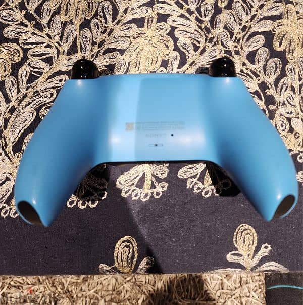 Playstation 5's controller (Starlight Blue) 1