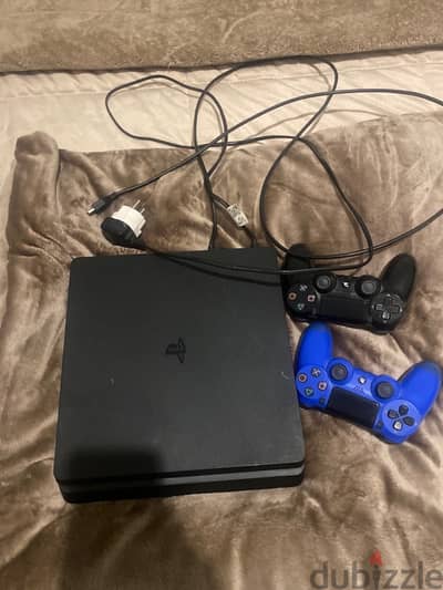 ps4 slim with 2 controllers and 10 games