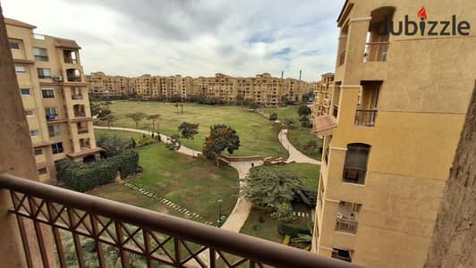 In Madinaty, an apartment for sale, area of ​​138 square meters, with a wide garden and panorama view, minutes from the Metromarket, the mosque, and t