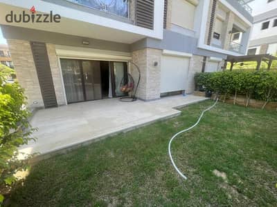 For sale, ground floor apartment of 179 sqm with a 70 sqm garden in One 16 Compound - Sodic Beverly Hills, finished, with kitchen and air conditioners