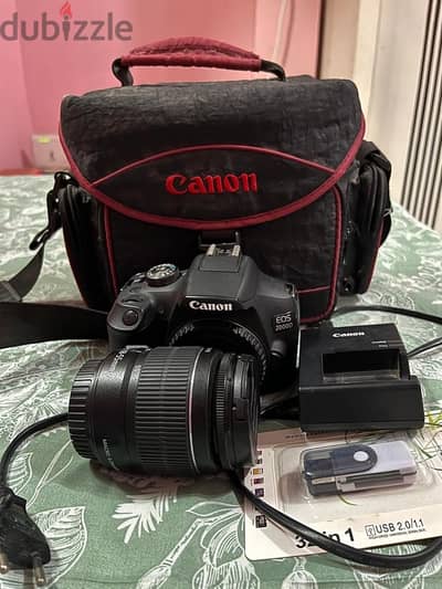 Canon eos 2000d ( tripod/ reader /memory card / bag )