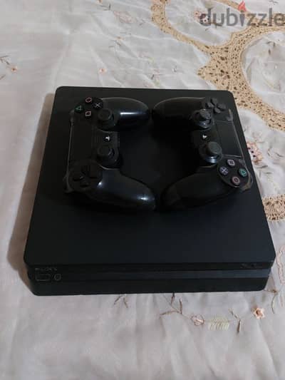 playstation 4 slim 500 gb with 2 controllers