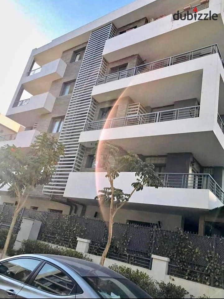 Apartment for sale in a private garden, in installments, on a very special view, on the landscape, in front of Cairo Airport, in the Taj City compound 0