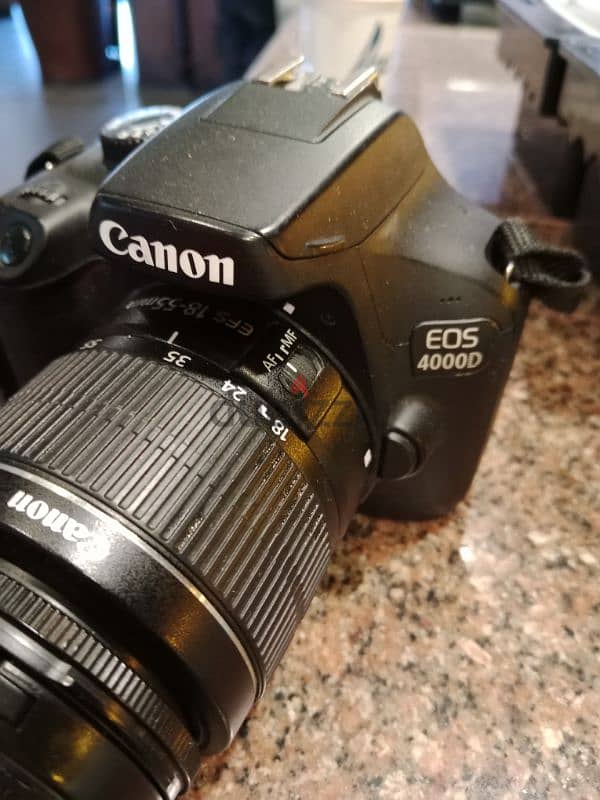 canon camera 4000D with charger and memory 128 6