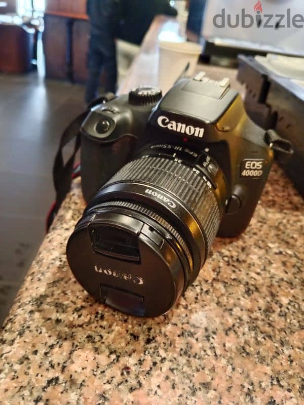 canon camera 4000D with charger and memory 128 7