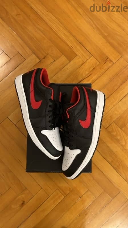 Jordan 1 low white toe 0