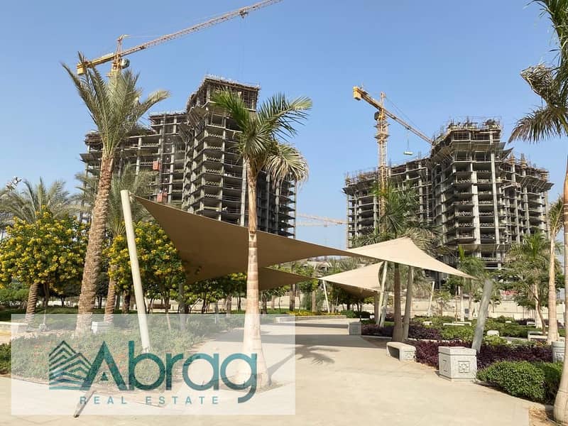 For sale, a ground floor apartment with a garden, 3 rooms, fully finished, in Zayed West, Sheikh Zayed Towers 0