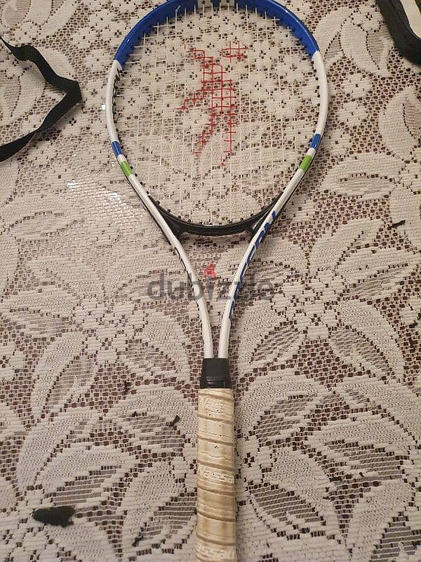 Nassau optimum tour tennis racket 1