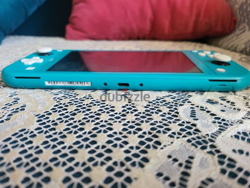 nintendo switch lite modded كل الالعاب بتنزل ببلاش الجهاز من السعودية 1