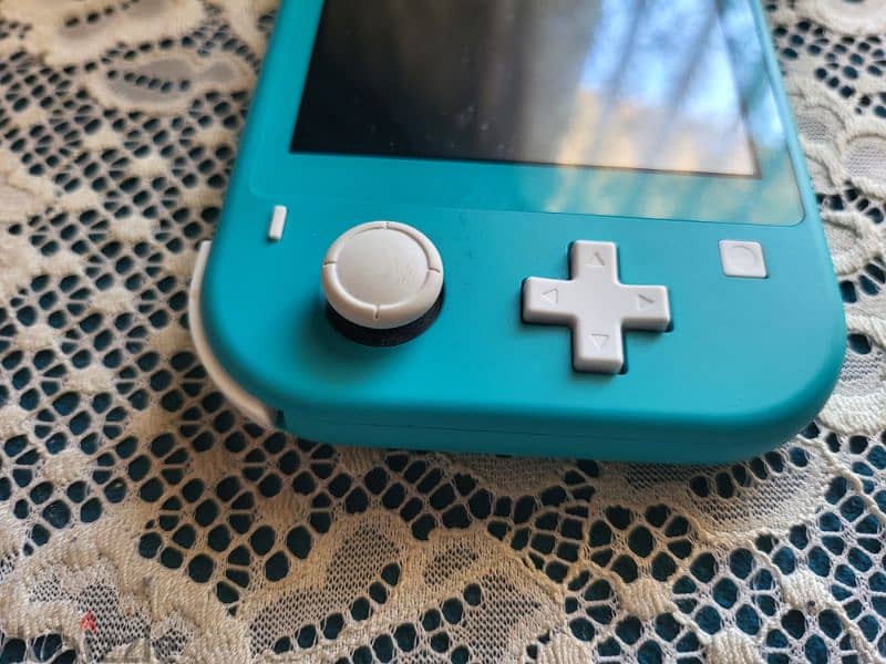 nintendo switch lite modded كل الالعاب بتنزل ببلاش الجهاز من السعودية 2