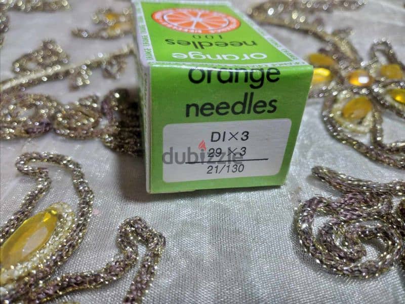 إبر مكن  orange needles 1