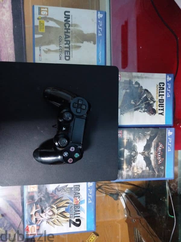 ps4 slim 1TB with 8 cd games + fifa23 account+bag 1