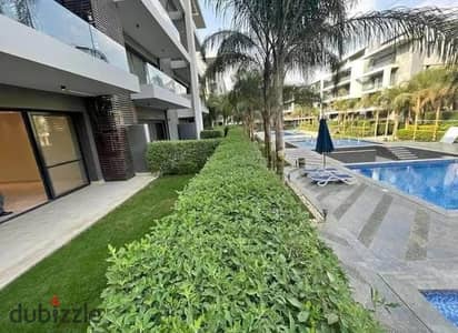 Ground floor apartment with garden, immediate receipt, for sale in El Patio Oro Compound, La Vista, Fifth Settlement, in installments, patio oro