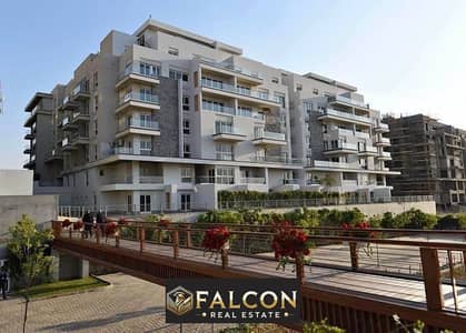 2BR apartment for sale, immediate delivery, with a view of Central Park in the heart of the compound, minutes from the AUC in  icity New Cairo compoud