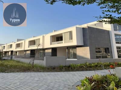 Townhouse for sale 305m, immediate delivery, in Joulz Compound, next to New Giza, sea view location, landscape and water feature