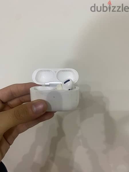 airpods pro with the box and cable 3