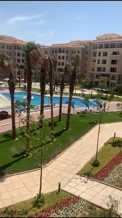 apartment For Rent ( Kitchen cabinets & appliances + AC's ) in 90 Avenue Compound ( Pool view ) New Cairo