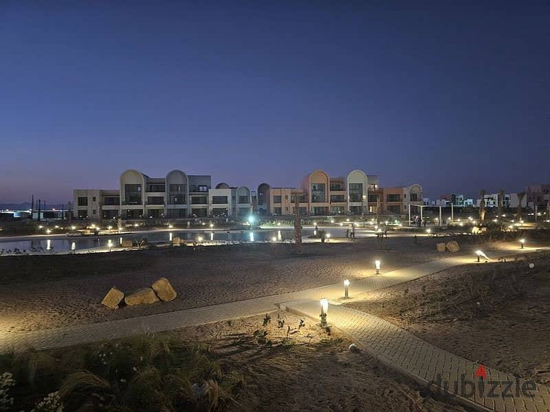 Apartment with garden for sale, direct view on the lagoon, finished with air conditioners and kitchen wood in El Gouna, receipt as soon as possible 0