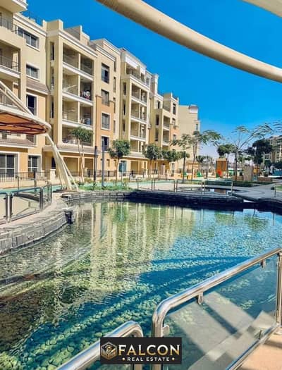 For sale, an apartment with a garden (with a 42% discount for cash) on the Suez Road, next to Madinaty, in Sarai Compound