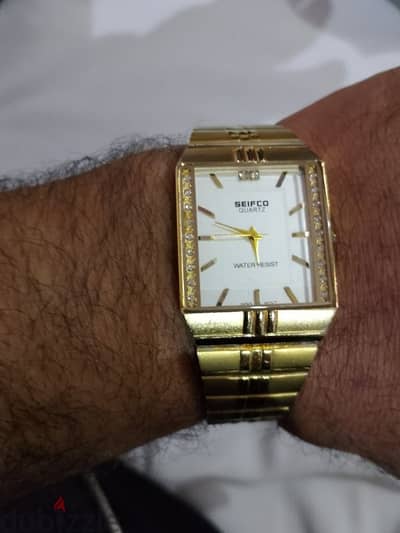 sefico  gold watch covered by 14k