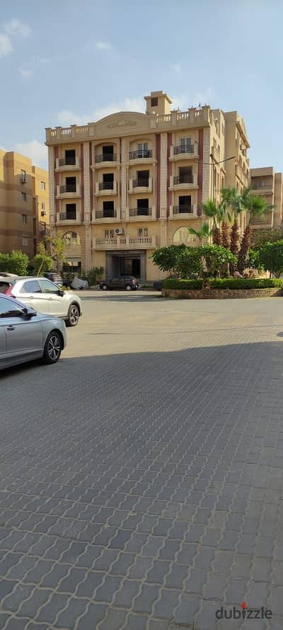 Apartment for sale with immediate delivery, ground floor with garden, in Al-Ashrafia Compound, New Cairo, next to Waterway, available with installmen