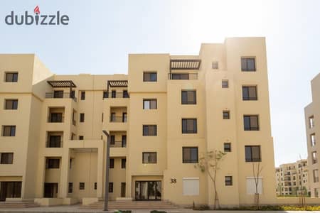 Resale apartment in OWEST compound, directly facing Mall of Egypt on Wahat Road. Bargain price with installment plan.