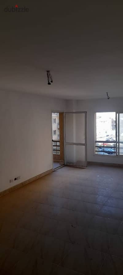 A 124 sqm apartment for sale in B6, Madinaty, directly facing the services and South Park.