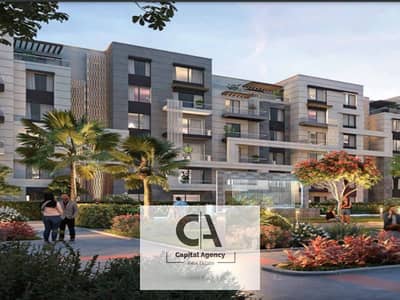 Installments over 12 years Apartment for sale with only 1.5% down payment in the heart of October in Badya Palm Hills Compound | View on the landscape