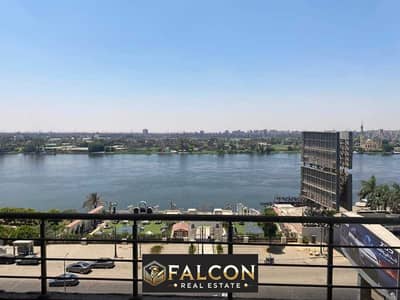 Hotel apartment with panoramic view on the Nile Corniche, furnished with appliances and air conditioners in the first hotel tower in Maadi