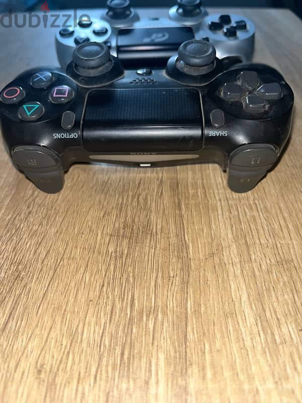 play station 4 slim 7