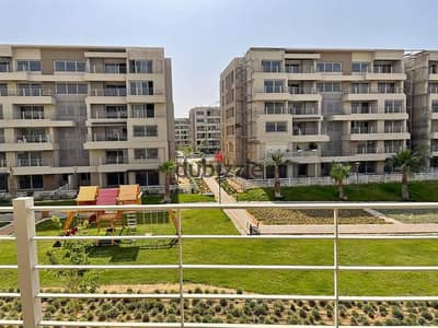 Apartment with a down payment of 180,000 and an installment of 14,000 for sale in Capital Gardens Compound in New Cairo.