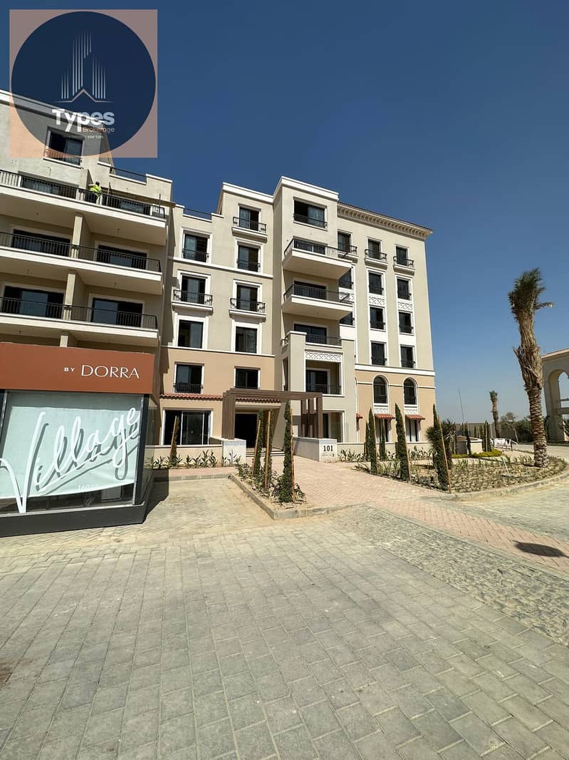 For sale, an apartment in Village West Compound, Sheikh Zayed, immediate delivery, fully finished with air conditioners, ultra super deluxe finishing, 0