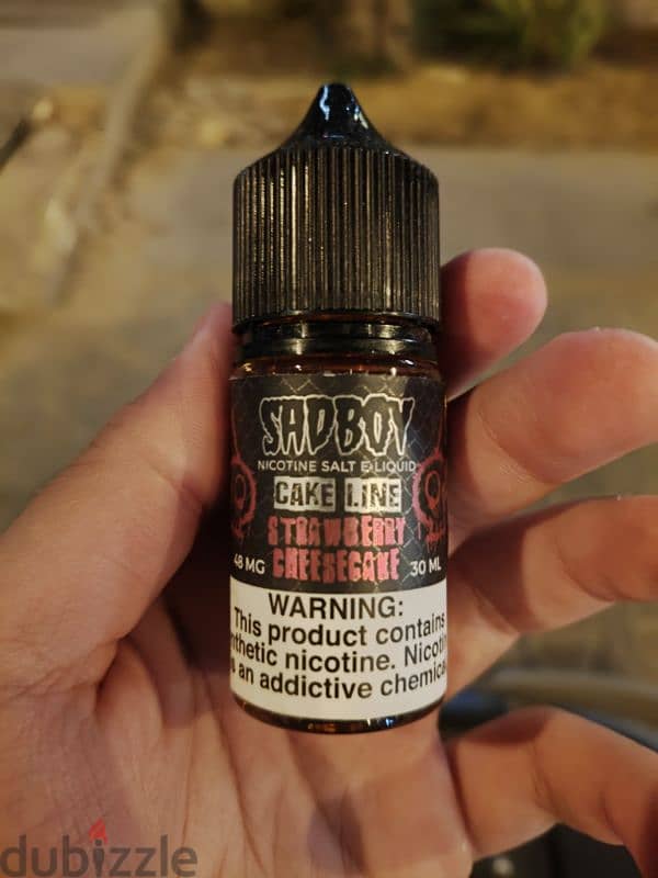 E-liquid. Sad boy strawberry cheesecake. 50mg nicotine 0