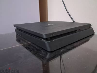 ps4 slim 500g used like new, with incredible performance