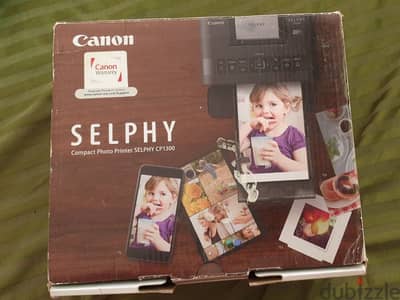 Canon selphy cp1300 compact photo printer camera/كاميرا كانون لطبع صور